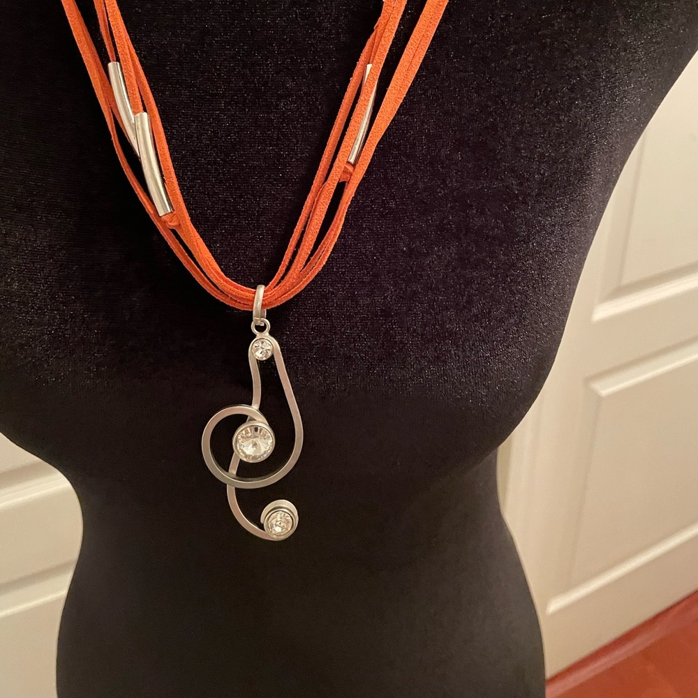 Leather and metal pendant necklace